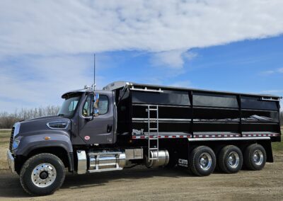 An agricultural truck waiting for grain to transport.