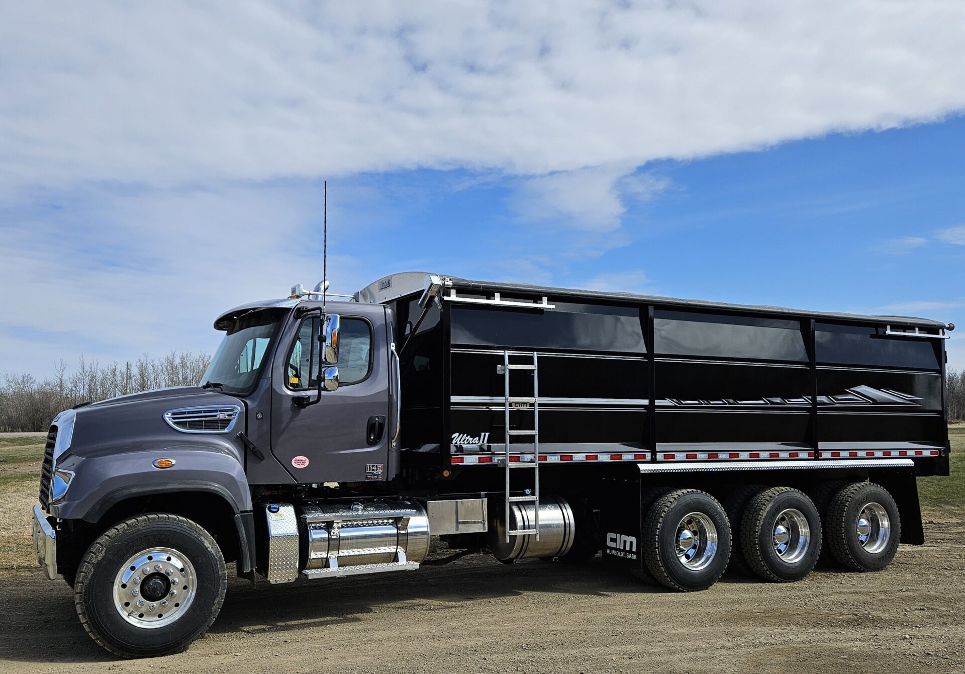 An agricultural truck waiting for grain to transport.