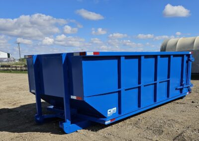 One of the roll off commercial garbage bins with a metal body.